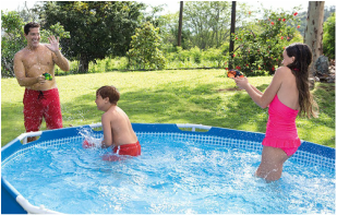 Family playing in a pool above ground